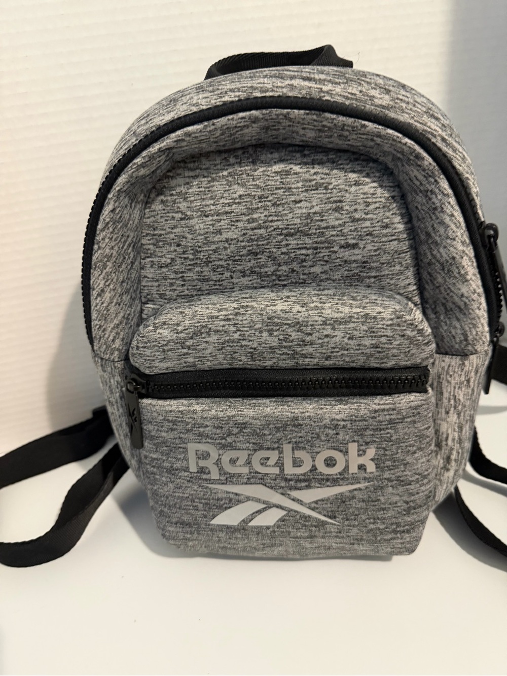 Reebok • Mini Sling Backpack • Heather Grey and Black